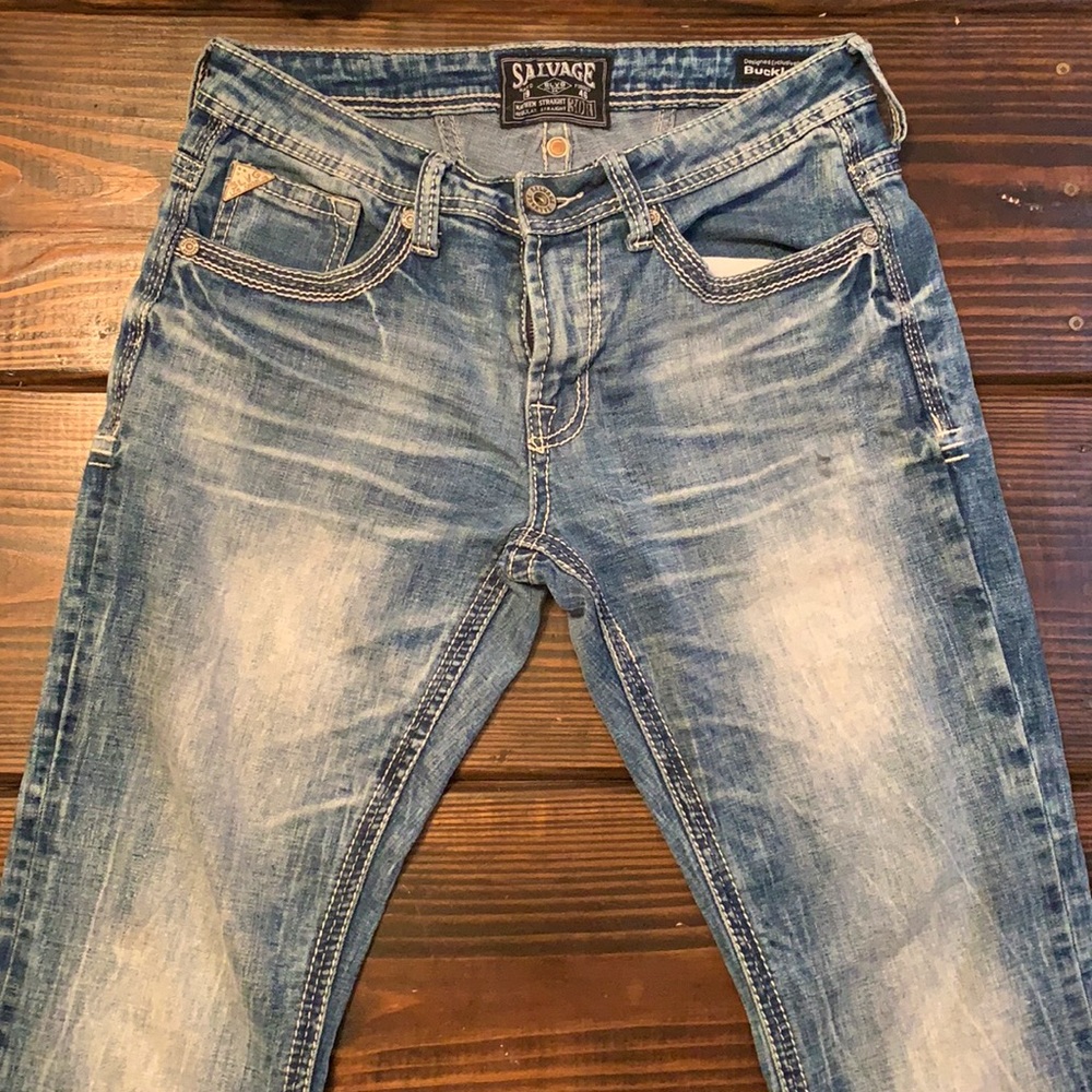 Light washed salvage jeans.  One tiny spot on front upper left  size 30R